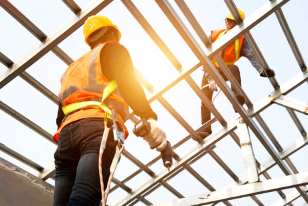 Roofs Leicester team on scaffolding at a residential job